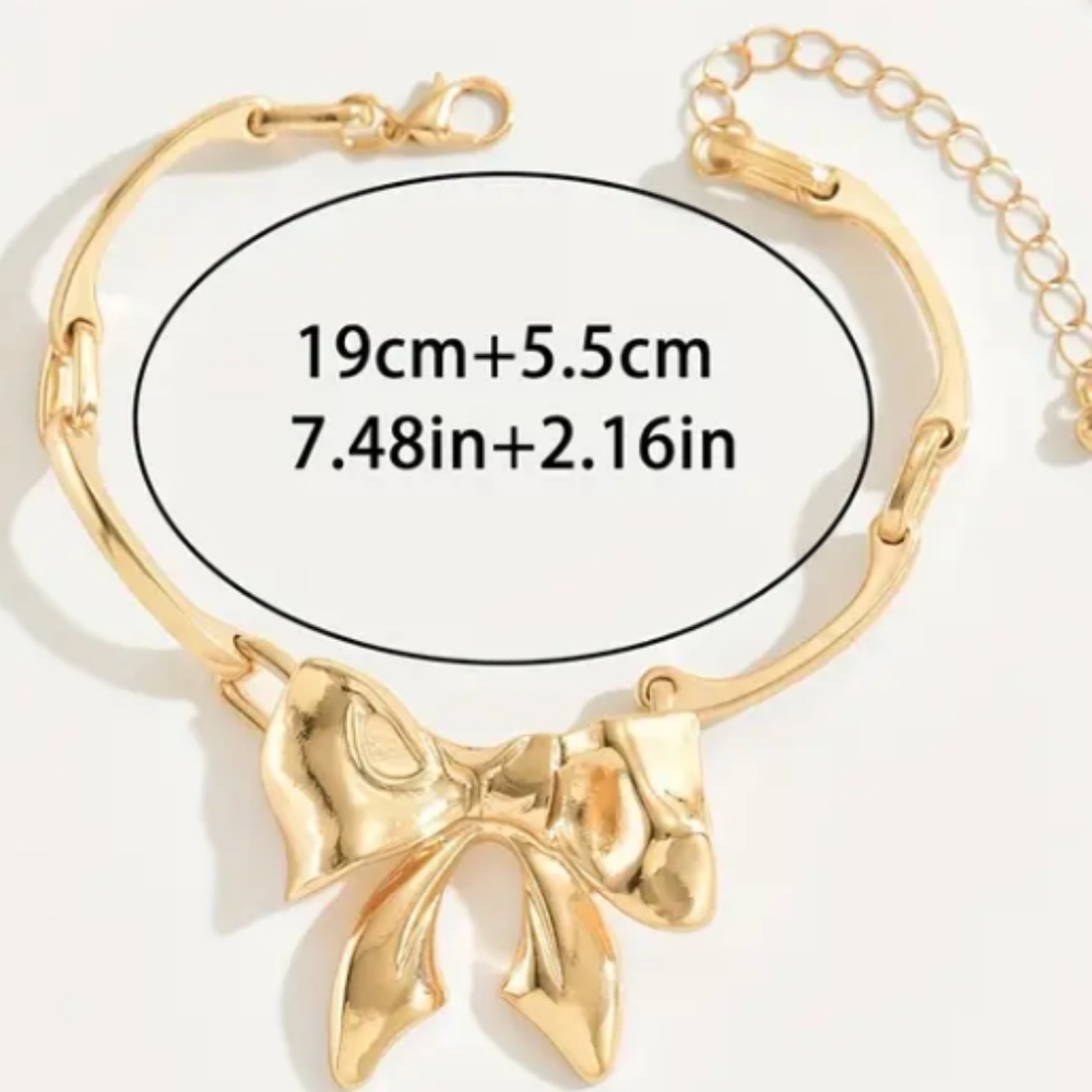 Gold Tone Bow Bracelet
